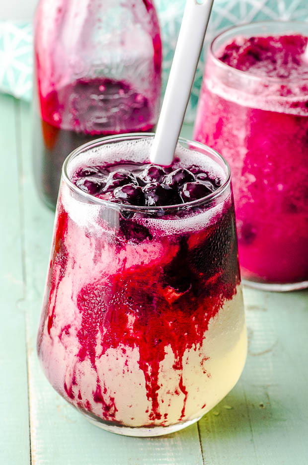 close up view of a glass of frozen blueberry lemonade