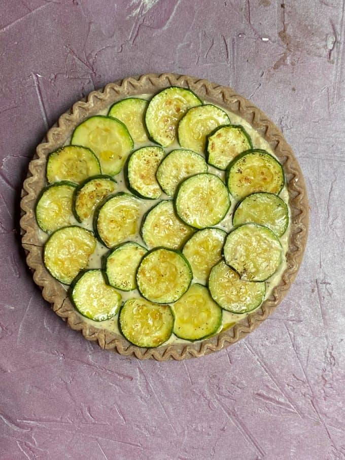 An overhead view of dairy free zucchini quiche before being baked