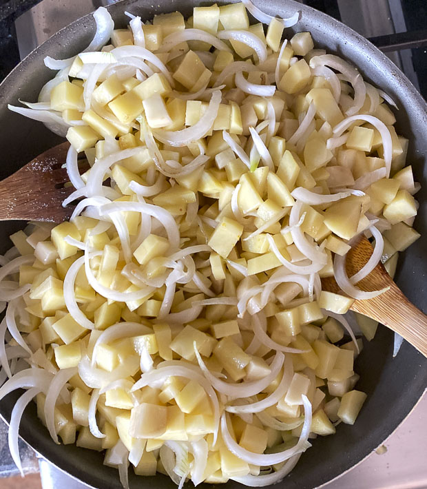 Potatoes and onions in a large skillet