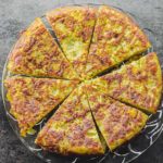 bird's eye view of a tortilla de patatas sliced into wedges