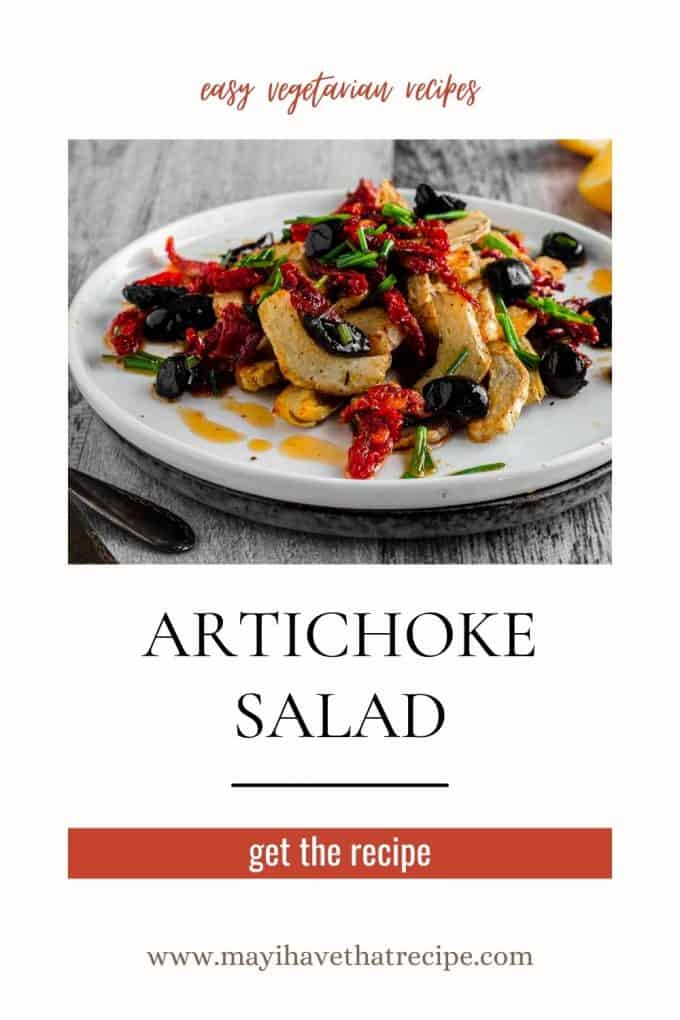 A tilted view of a plate of artichoke salad