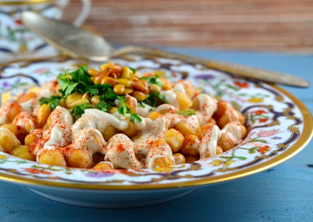 A different way of eating Hummus, warm chickpeas with tahini and pine nuts