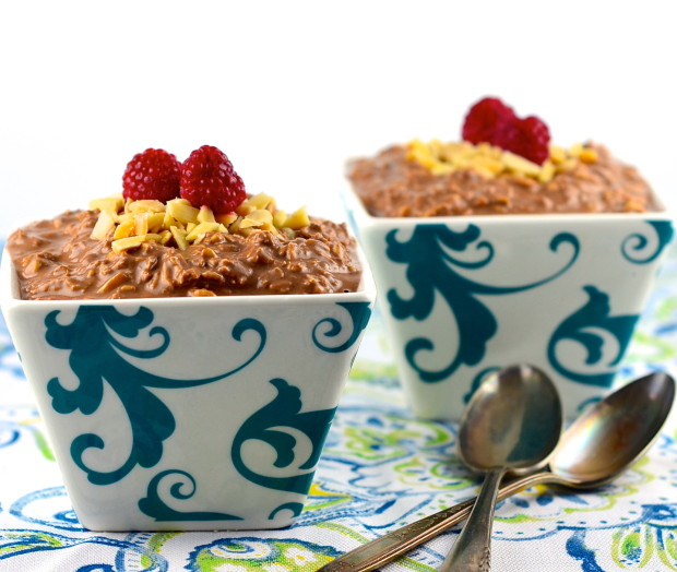 Two white and blue square bowl with chocolate peanut butter overnight oats
