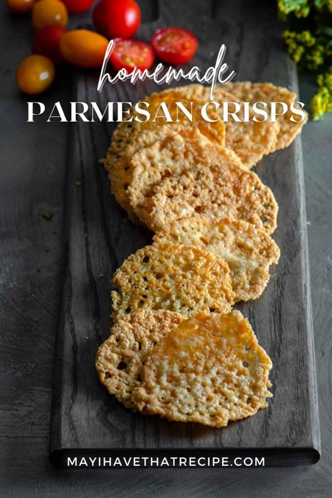 A closer view of parmesan Crisps being stacked onto each other on slate plate