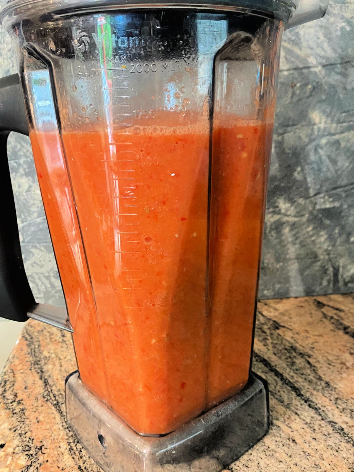 blending gazpacho ingredients in a blender