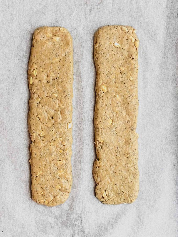 two unbaked biscotti logs