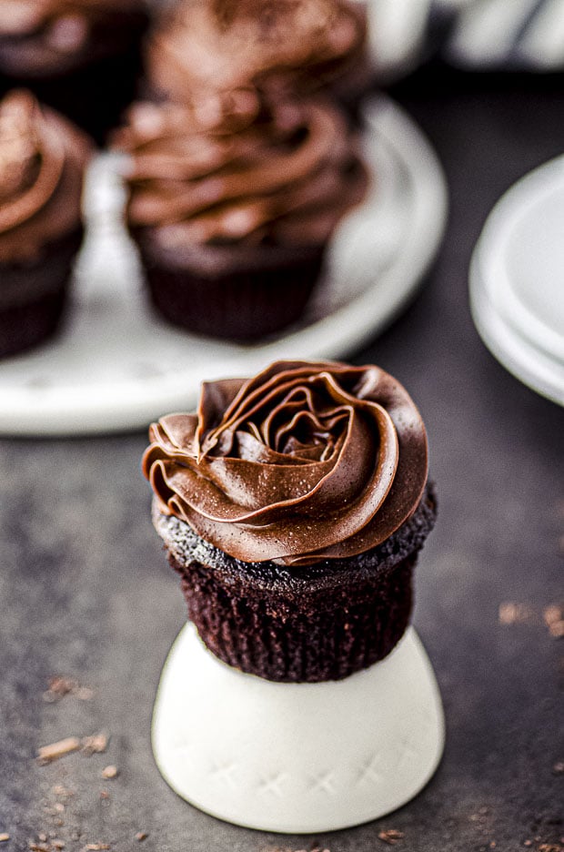 Close up view of a chocolate cupcake with chocolate frosting