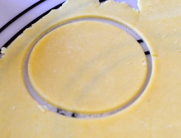 boureka dough scored with a circle from a glass