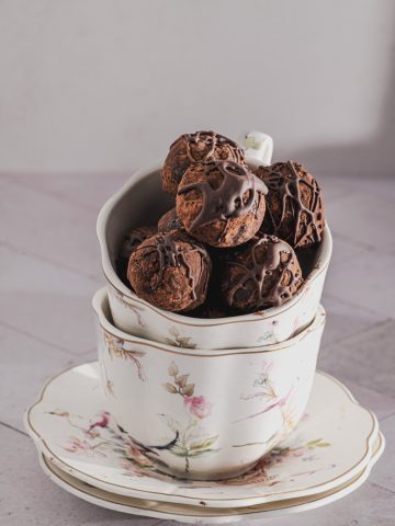 Date balls in two stacked tea cups