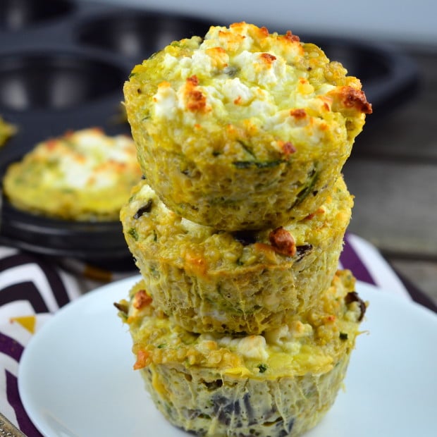 Three Mushroom, Zucchini & Quinoa Breakfast Muffins piled on a white plate.One of our vegetarian Passover recipes.