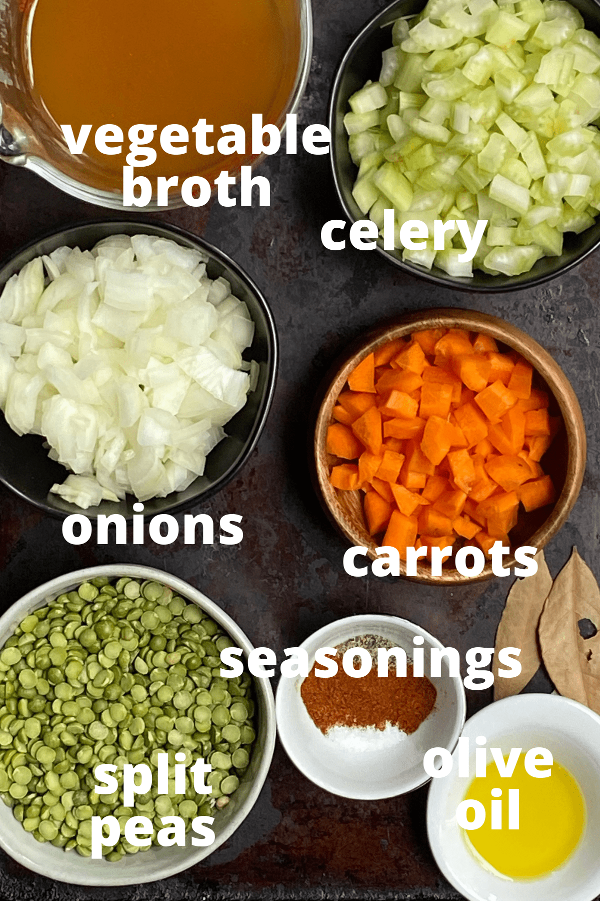 An overhead view of the ingredients to make vegan split pea soup; vegtable broth, celery, onions, carrots, seasonings, split peas, and olive oil