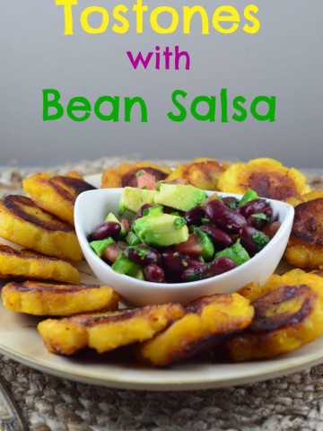Tostones with Black Bean Salsa – Vegan, vegetarian, and Gluten Free - Plantains, pan fried to perfection are the perfect vehicle for the healthy black bean salsa. Perfect for your next party, meatless monday dinner, or Super Bowl party