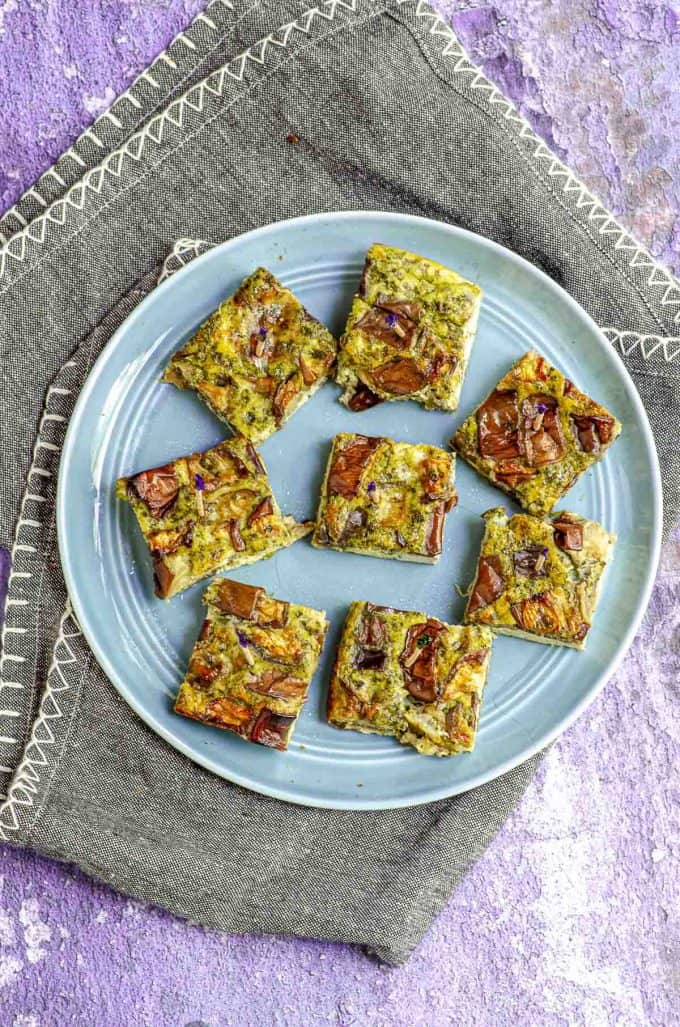 An overhead view of rectangular slices of eggplant frittata