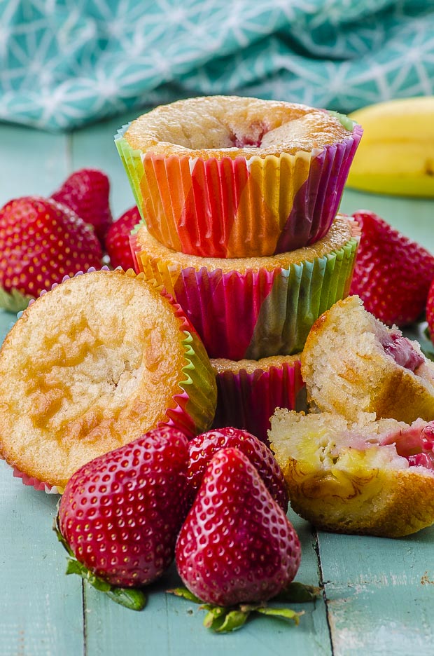 Side view of pile banana and strawberry yogurt muffins