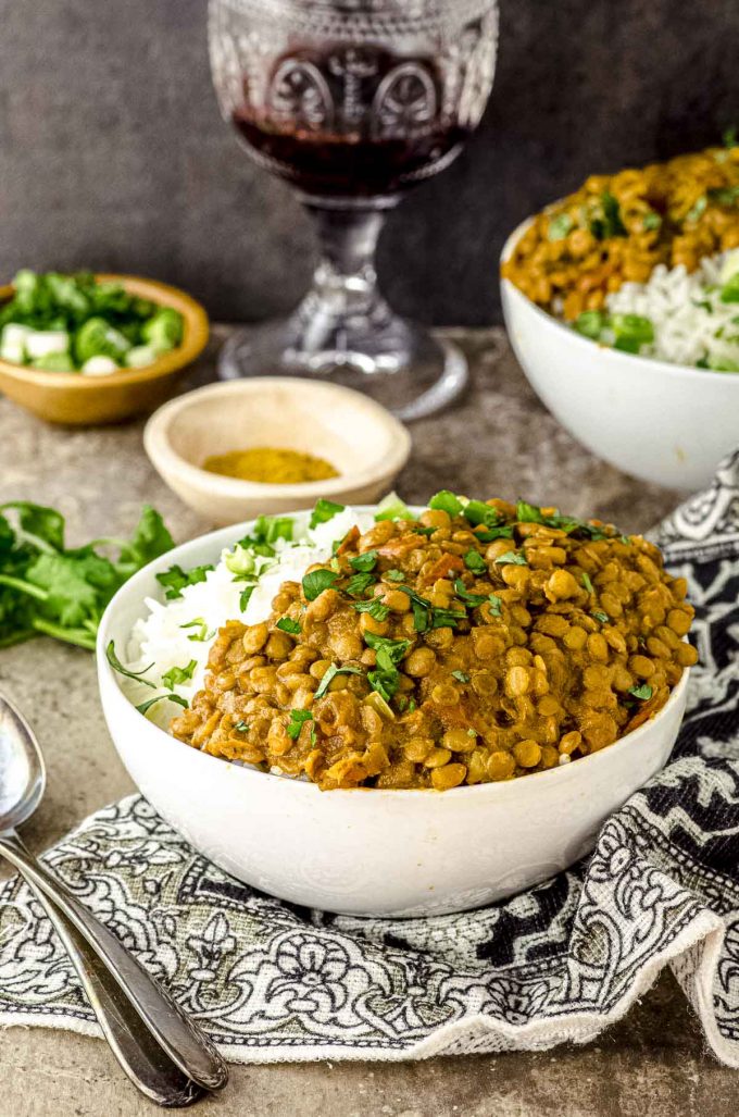 Side View of a bowl of curry lentils with white rice