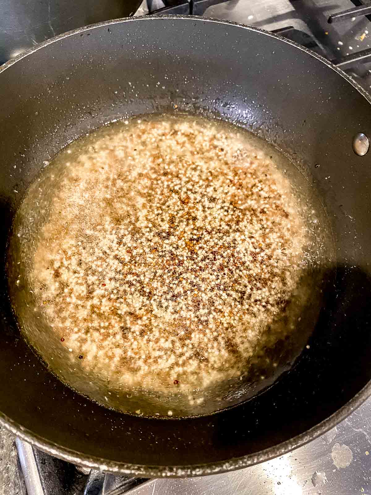 Water and quinoa in a pot