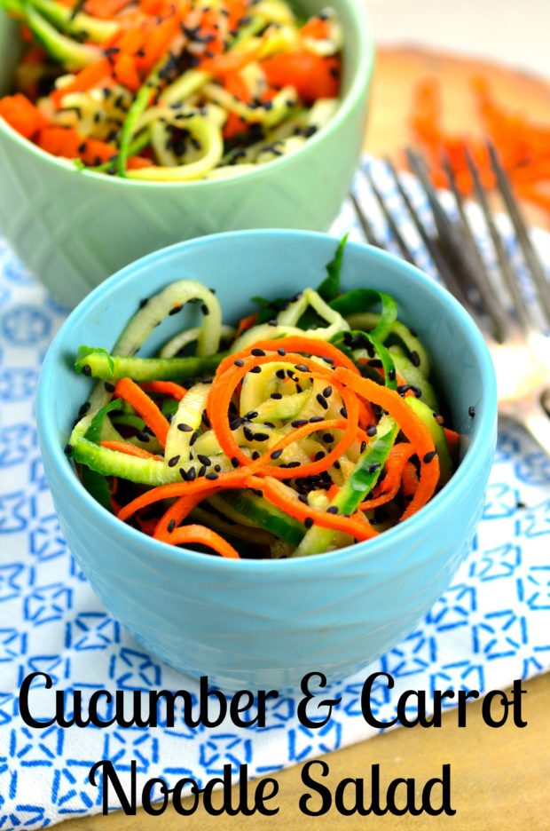 Spiralized Cucumber & Carrot Noodle Salad - it only takes 5 minutes to make this refreshing and healthy summer salad with tangy rice vinegar and nutty sesame seeds.