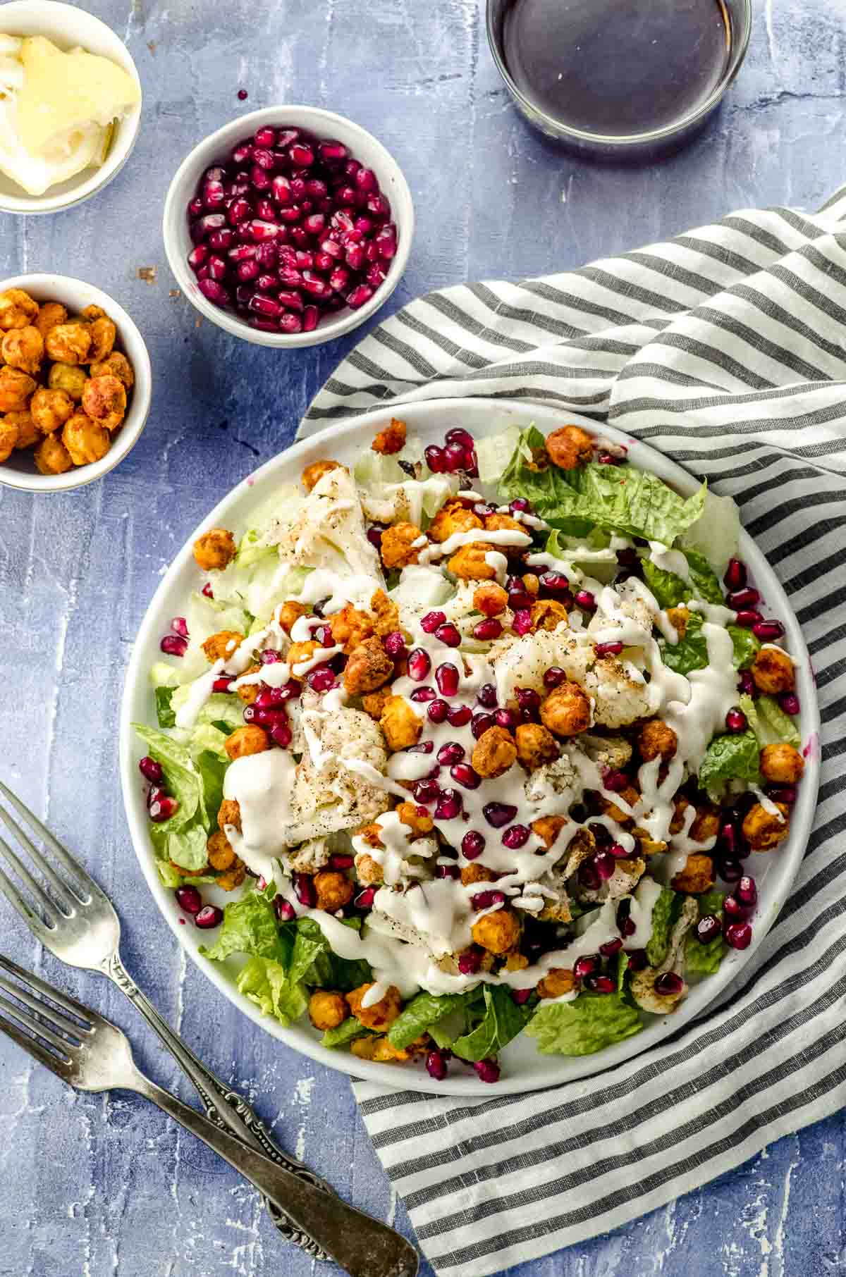 Overhead view of a roasted cauliflower salad with spiced chickpeas