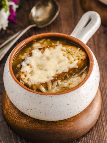 A ramekin with vegetarian French Onion soup