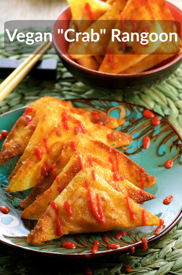 A green Chinese style plate filled with vegan crab rangoon drizzled with Sriracha sauce