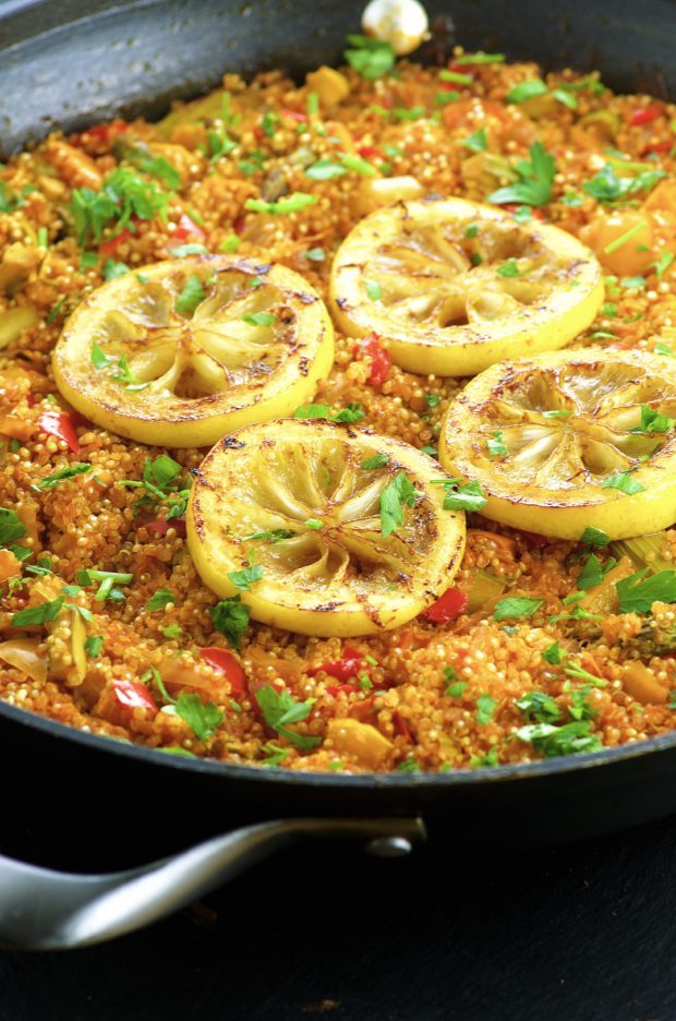 Close up view of a Vegetarian Quinoa Paella, in a paella pan. A vegan Passover recipe.