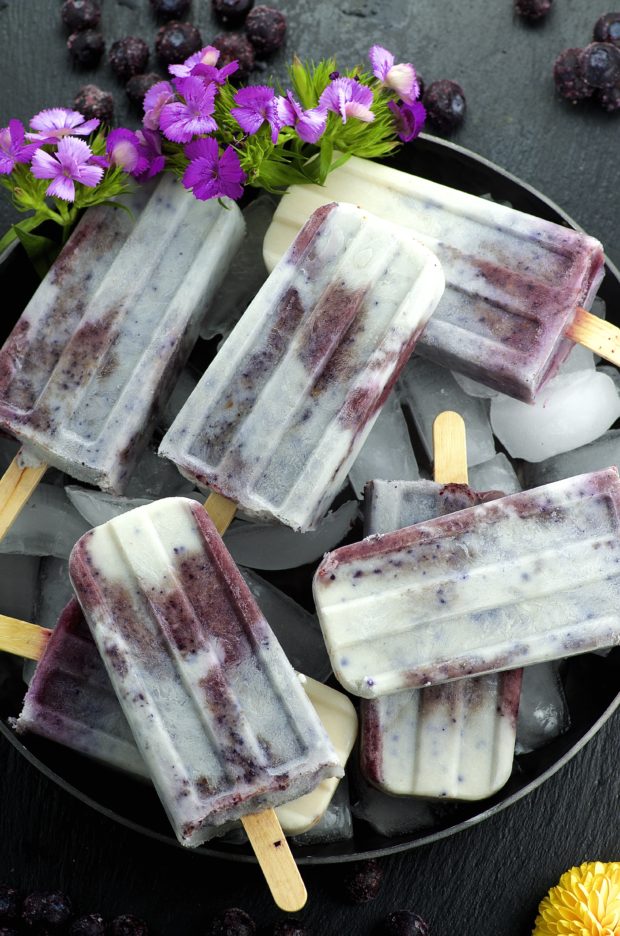 You'll love how simple and easy to prepare these Blueberries And Cream Popsicles are. An awesome summer treat!