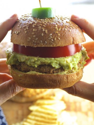 Super tasty and never boring Cauliflower veggie burger with a tangy avocado guacamole. Vegan
