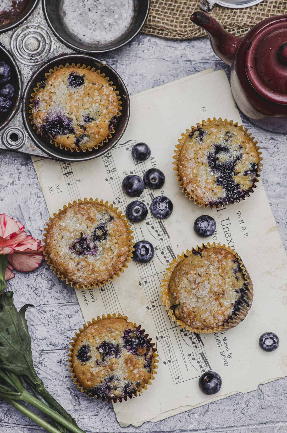 A closer overhead view of blueberry cornbread muffins