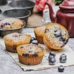 A closer view of stacked blueberry corn muffins