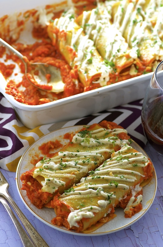 These Pumpkin Stuffed Green Lentil vegan Cannelloni make a super satisfying meatless dish to add to your Thanksgiving table!