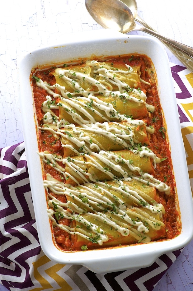 These Pumpkin Stuffed Green Lentil Vegan Cannelloni make a super satisfying meatless dish to add to your Thanksgiving table!