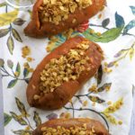 Creamy Thanksgiving stuffed sweet potatoes with a crunchy oat, maple and pecan topping. Vegan, vegetarian, Gluten Free