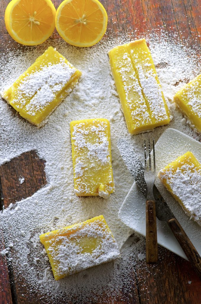 Overhead view of four Vegan Meyer Lemon Bars