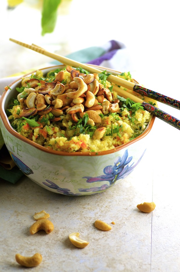 A flowery bowl filled with cauliflower fried rice. One of our vegetarian Passover recipes.