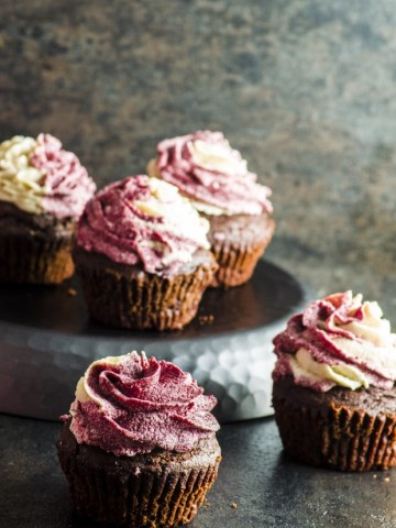 Vegan Pomegranate Tahini Cupcakes - rich and moist chocolate cake topped with creamy tahini and pomegranate molasses icing.