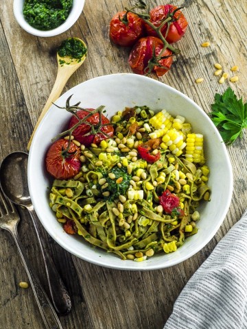 This Edamame Pasta With Chimichurri Sauce gives a nice protein boots and is a  great summery vegan dish. You can enjoy it cold or warm! We used roasted garlic for our chimichurri sauce, for a milder garlic flavor that doesn't stay with you all day.