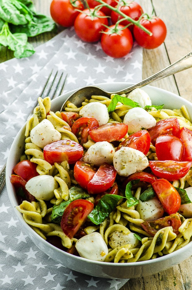 High Protein Caprese Pasta Salad - A light and fresh gluten free dish full of protein and fiber, perfect for lunch or as a light dinner this summer! It can also be made Vegan!