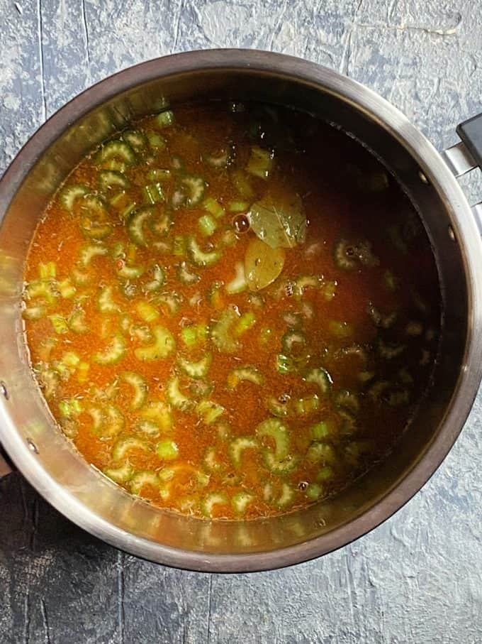 overhead view of a pot of chickpea soup 