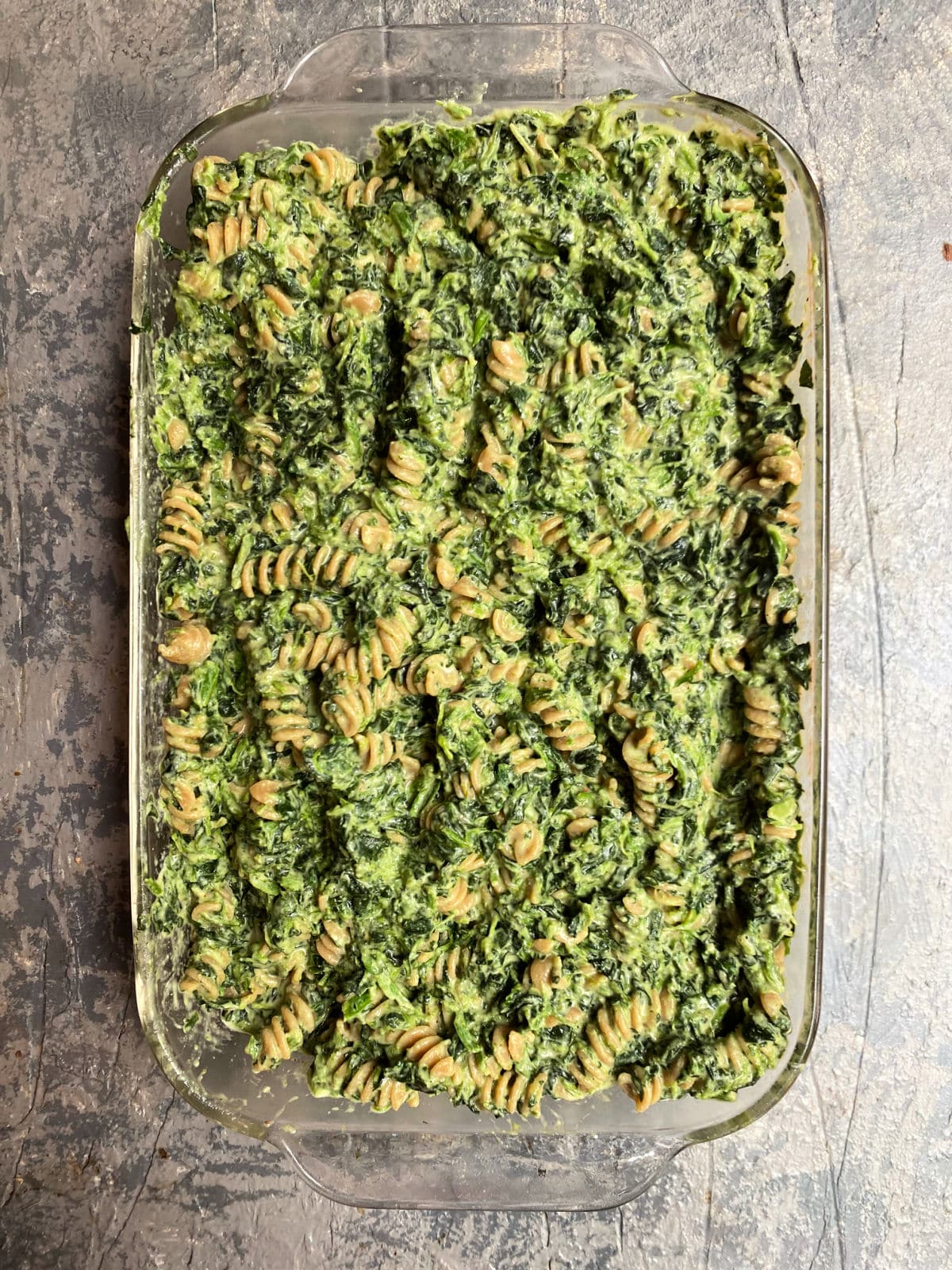 Creamed spinach and chickpea pasta in a baking  dish