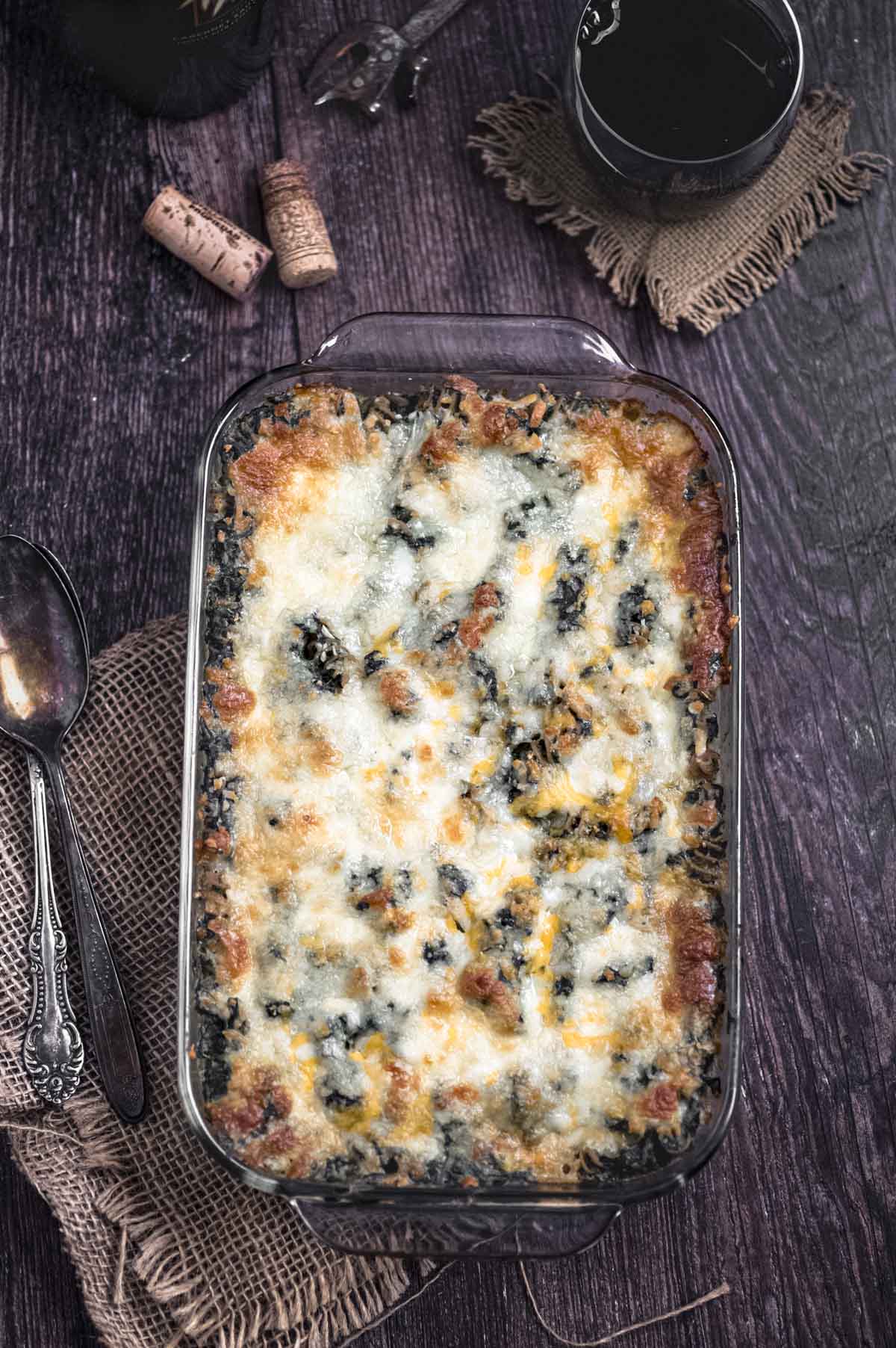 Overhead view of high protein creamed spinach pasta bake
