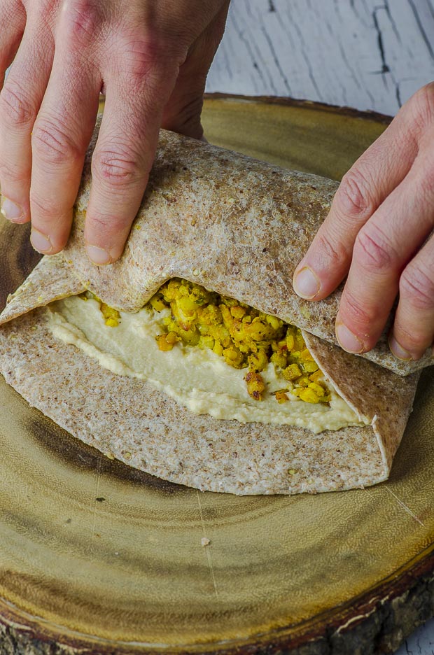 Rolling a vegan breakfast burrito.