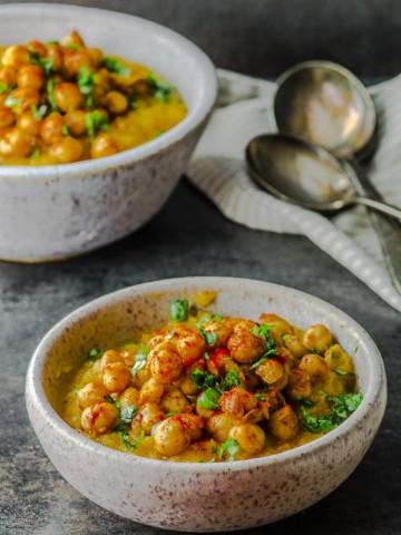 two bowls of Mashed Butternut Squash with Spiced Chickpeas