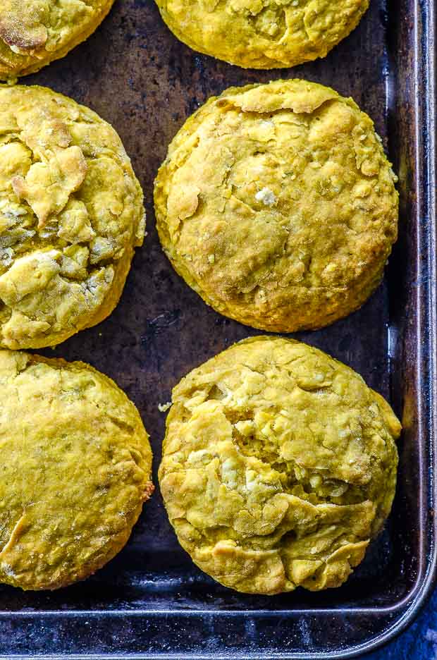 six sweet potato vegan biscuits lined on a baking sheet