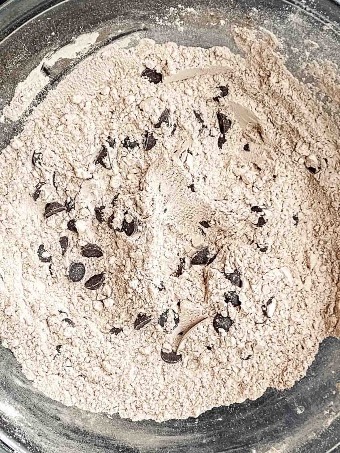 Chocolate chips added to flour/coca mixture