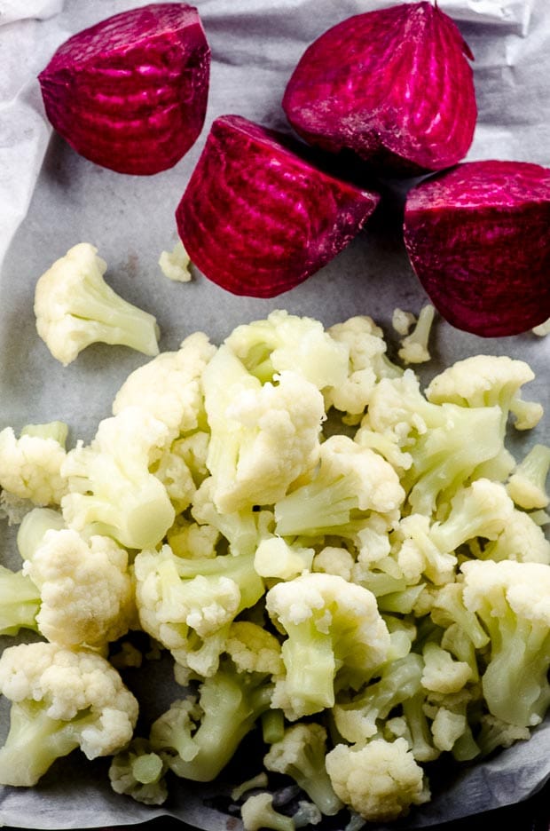 beets and cauliflower in a baking sheet