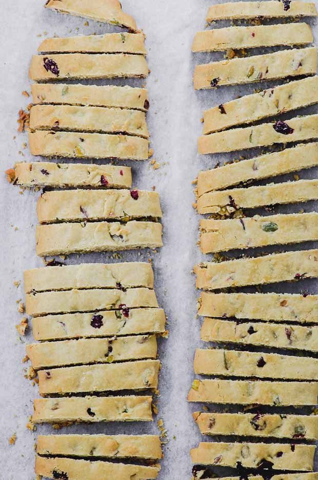 cranberry pistachio baked biscotti dough cooled and sliced