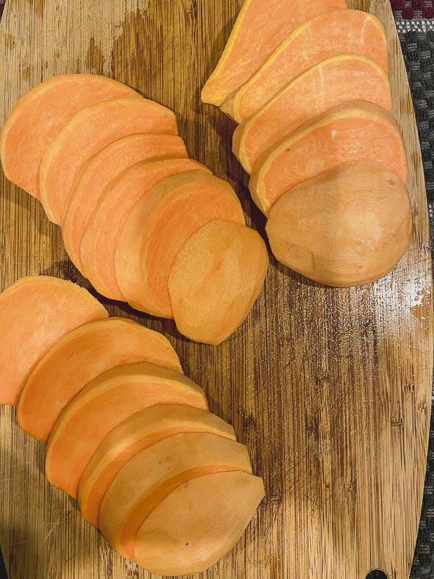 Sliced sweet potatoes to make sweet potato fries