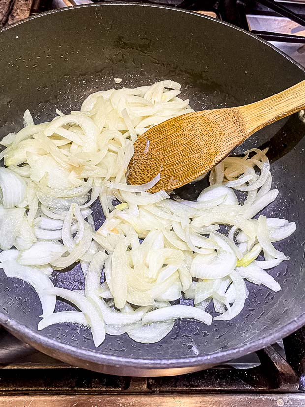 Sautéing onions in a pan