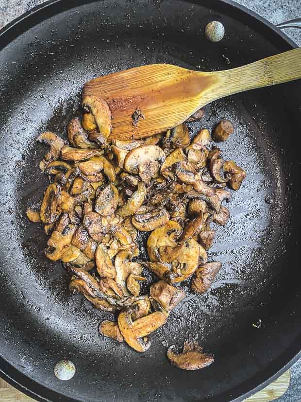 Cooked mushrooms with shawarma spices in a skillet