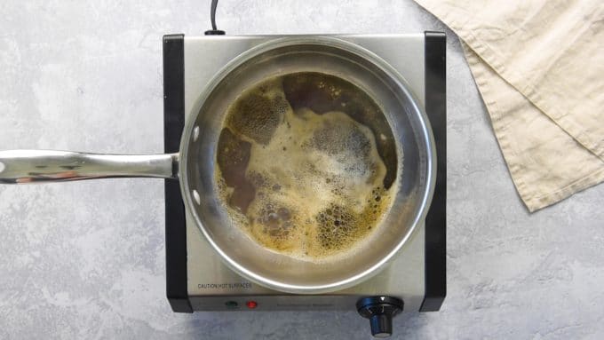 Heating stout beer in a pan